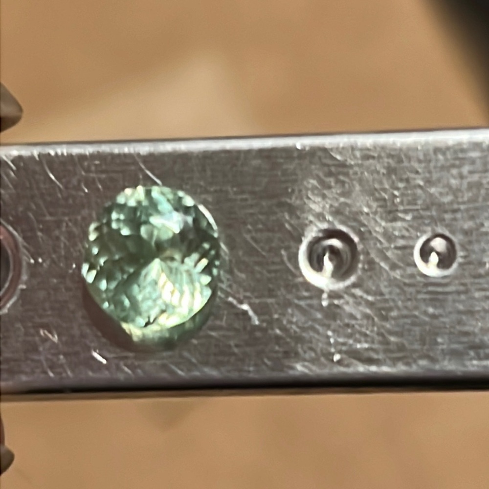 1+ carat moissanite.